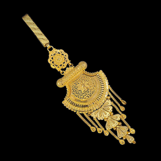 A gold lacquered plated copper keychain with intricate designs and decorative elements.